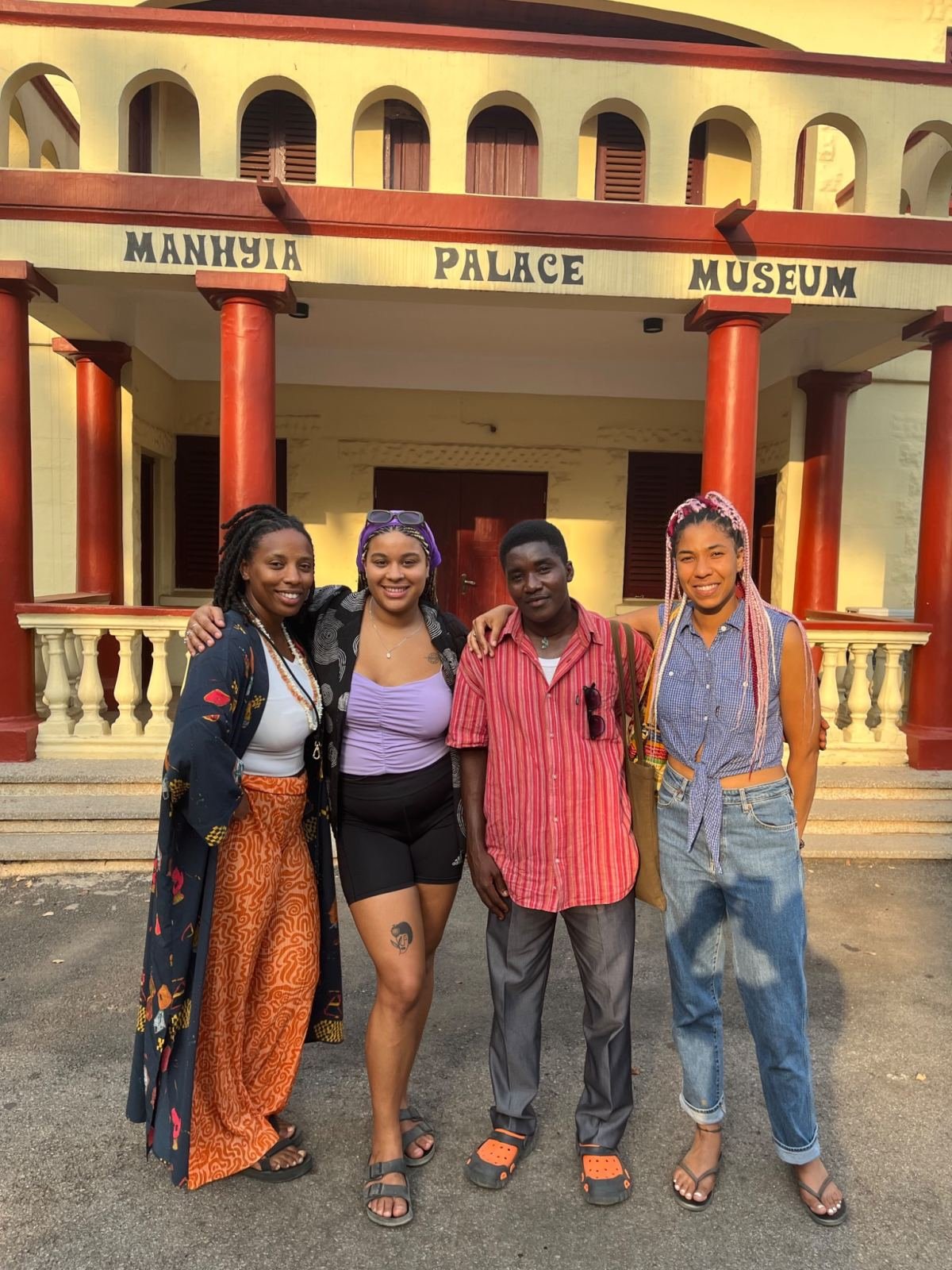Massinda Zinga with collaborators outside the Manhyia Palace Museum in Kumasi, Ghana