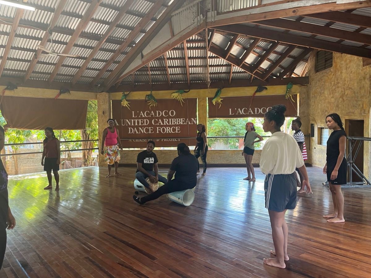 A group workshop on the wooden floor of the L’ACADCO United Caribbean Dance Force studio